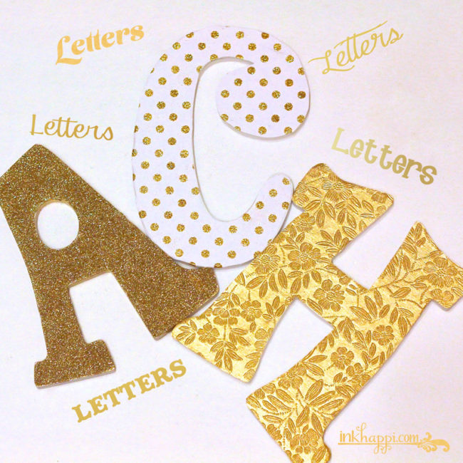 Crafting with letters... Gold glitter and textured paper letters for my studio!